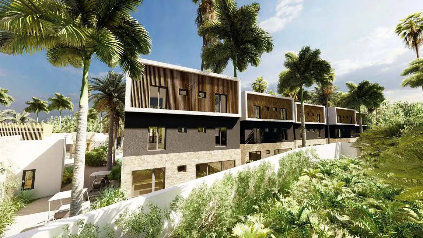 Vela Paje residence buildings among tropical gardens · project brochure visualisation